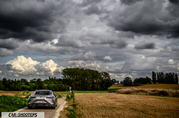 Lexus LC500h – rear view, silver on a country road