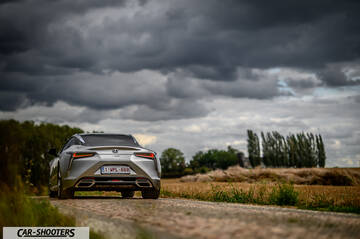 Lexus LC500h – rear view, silver on a country road