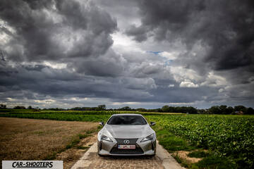 Lexus LC500h – front three-quarter, silver on a country road