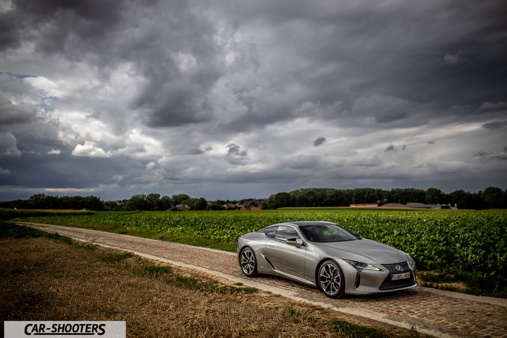 Lexus LC500h – front three-quarter, silver on a country road