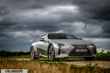 Lexus LC500h – front three-quarter, silver on a country road