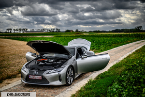 Lexus LC500h – front three-quarter, silver on a country road