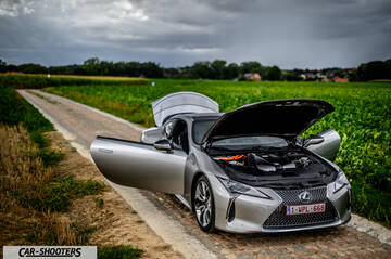 Lexus LC500h – front three-quarter, silver on a country road