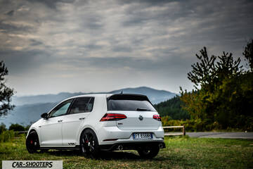 Volkswagen Golf Gti Tcr – rear three-quarter, white against a mountain backdrop