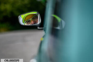 Autobianchi A112 – detail, side mirror reflection of a driver