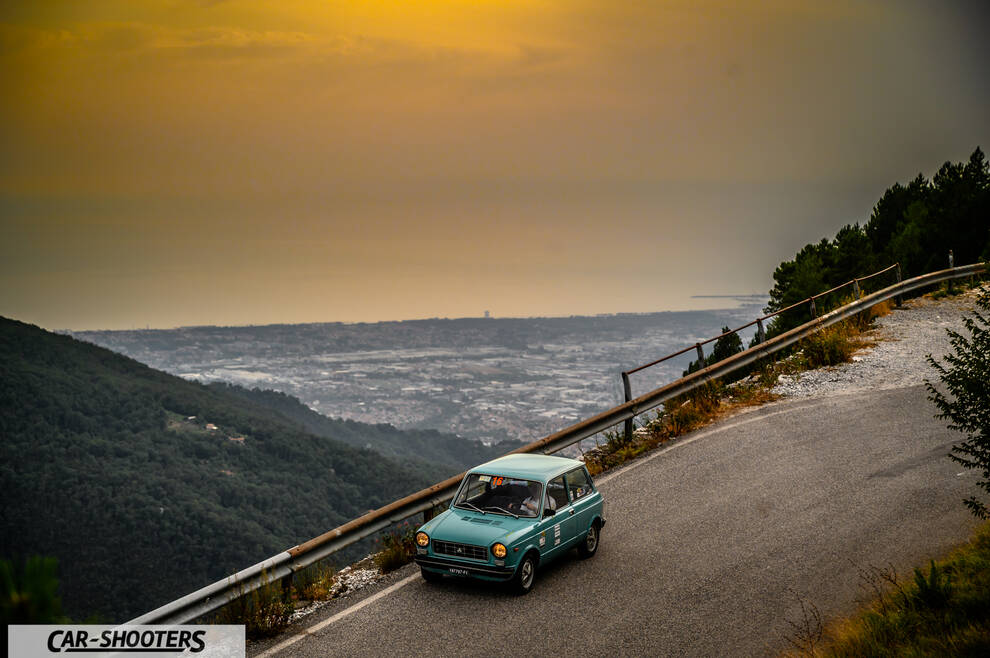 Autobianchi A112 – front three-quarter, teal on a mountain road