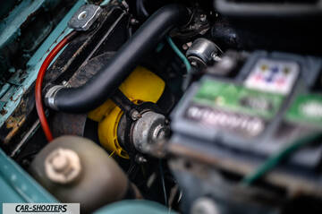 Autobianchi A112 – engine bay, with a yellow cooling fan