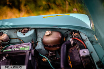 Autobianchi A112 – engine bay, coolant reservoir and battery visible
