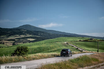 Mercedes Benz GLE – rear view, black on a country road