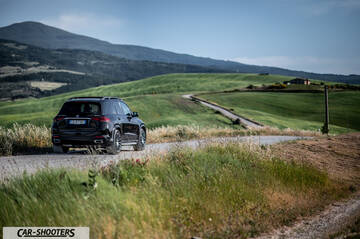 Mercedes Benz GLE – rear view, black on a country road