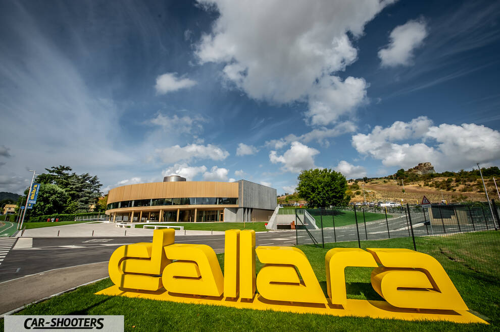 Dallara – detail, building exterior with yellow signage