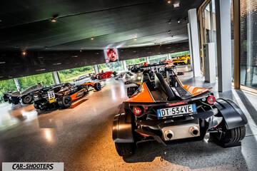 Dallara – rear view, orange in a car museum