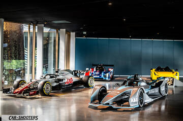 Dallara – front three-quarter, silver and black on display inside a showroom