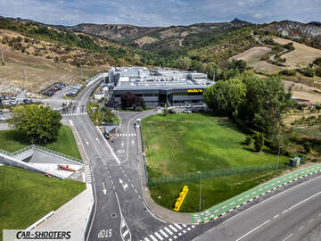 Dallara – detail, aerial view of factory and hills