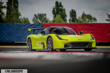 Dallara Stradale – front three-quarter, yellow on a race track