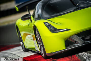 Dallara Stradale – front three-quarter, yellow on a racetrack