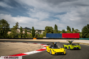 Dallara Stradale – front three-quarter, yellow on a race track