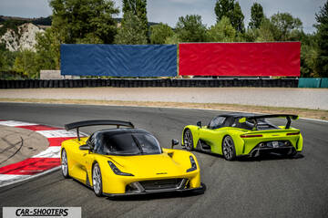 Dallara Stradale – front three-quarter, yellow on a race track