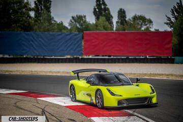 Dallara Stradale – front three-quarter, yellow on a racetrack