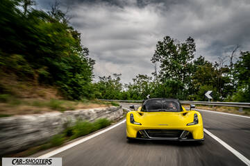 Dallara Stradale – front three-quarter, yellow on a country road