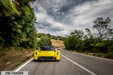 Dallara Stradale – front three-quarter, yellow on a country road