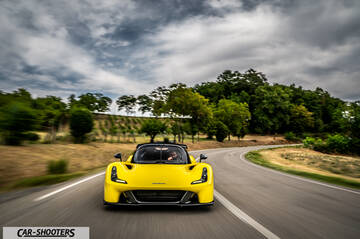 Dallara Stradale – front three-quarter, yellow on a country road