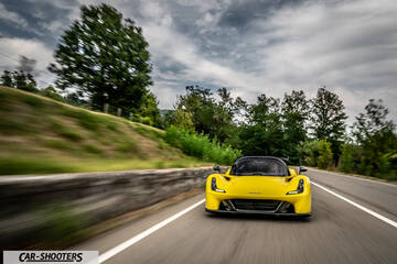 Dallara Stradale – front three-quarter, yellow on a country road