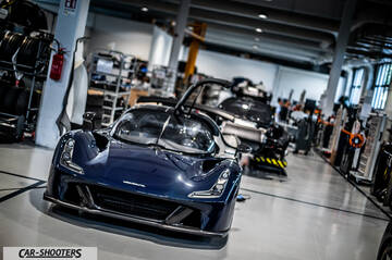 Dallara – front three-quarter, dark blue in a workshop