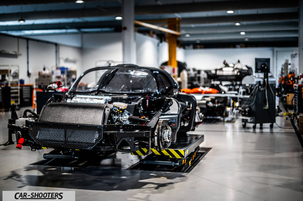 Dallara – front three-quarter, exposed carbon fiber in a manufacturing facility