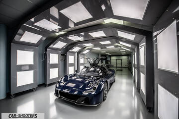 Dallara – front three-quarter, dark blue in a well lit studio