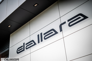 Dallara – detail, brand logo on building facade