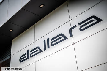 Dallara – detail, brand logo on building facade