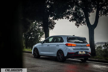 Hyundai i30N – rear three-quarter, white parked on a roadside