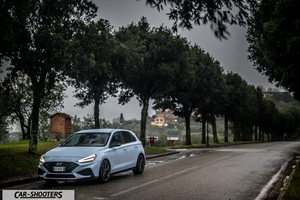 Hyundai i30N – front three-quarter, light blue on a country road