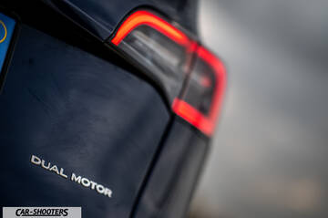 Tesla Model Y – detail, taillight and badge close-up
