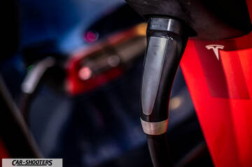 Tesla Model Y – detail, charging cable plugged in close-up