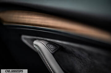 Tesla Model Y – detail, interior door handle close-up