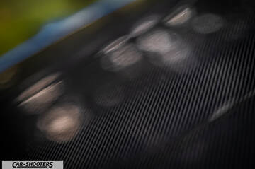 Alpine A110 – detail, carbon fiber texture close-up