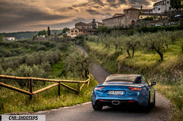 Alpine A110 – rear view, blue on a country road