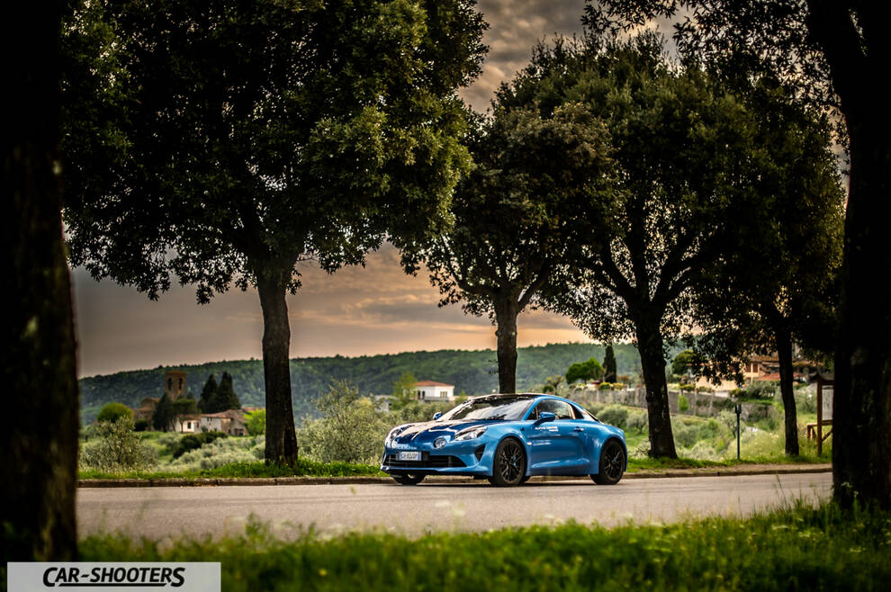 Alpine A110 – side profile, blue on a country road