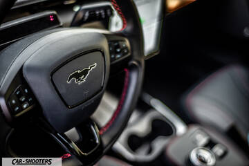 Ford Mustang Mach E – dashboard, steering wheel with red stitching