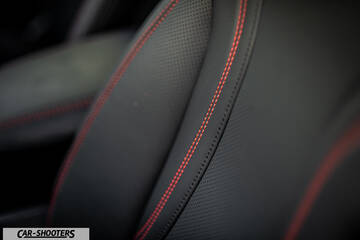 Ford Mustang Mach E – interior, leather front seats with red stitching