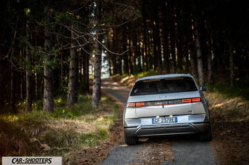 Hyundai Ioniq 5 – rear view, silver on a forest road