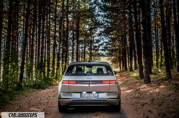 Hyundai Ioniq 5 – rear view, silver on a forest road