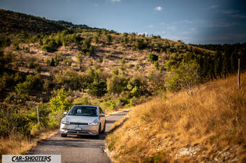 Hyundai Ioniq 5 – front three-quarter, silver on a country road