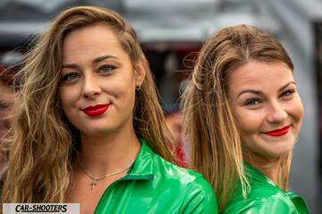 detail, two models with green outfits