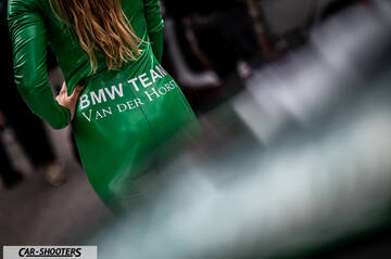 detail, person in green racing suit