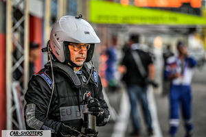 detail, racing driver in pit lane