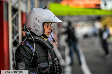 detail, driver wearing racing gear