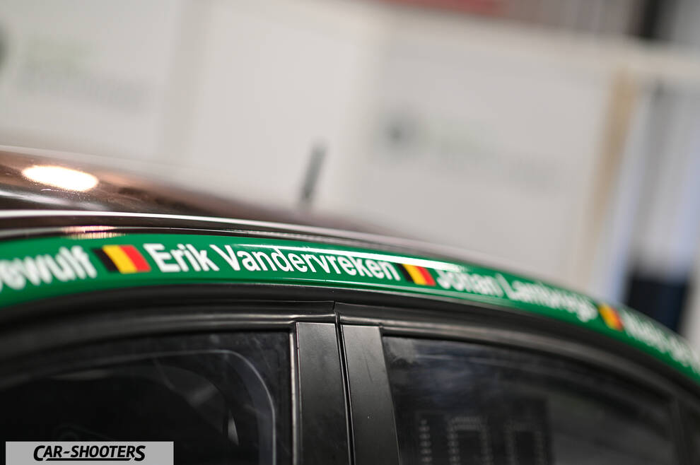 detail, driver names and flags sticker on roof line